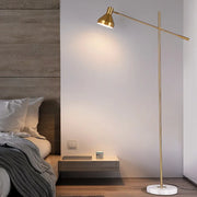 Lampadaire doré salon